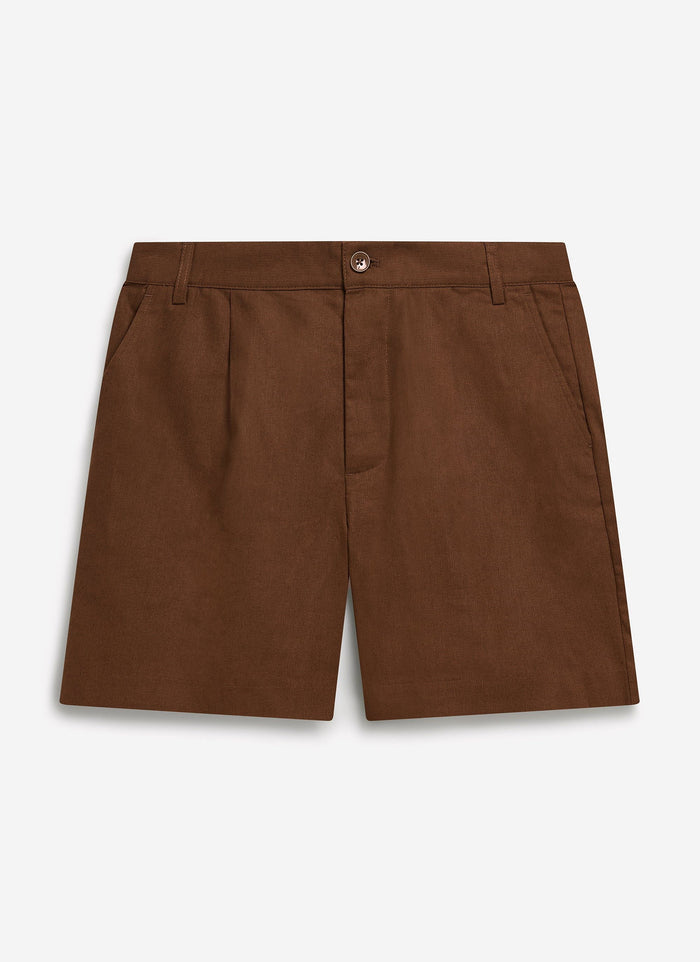 The Percival Pleated Linen Shorts in brown, laid flat to show the tailored fit and front pleat detail.