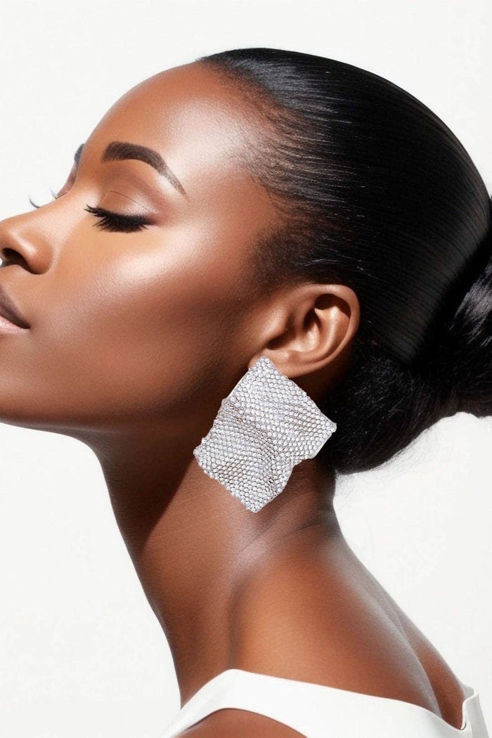 Style the Wavy Silver Rhinestone Glam Stud Earrings exclusively at Born To Glam