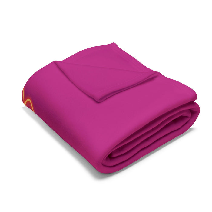 Polyester throw blanket with colorful heart artwork shown as a home decor accent for beds, couches and sofa and room styling.
