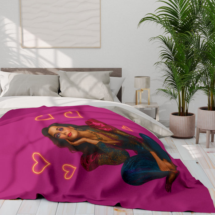 Colorful polyester fleece throw shown as a decorative blanket for bedrooms, couches, seating areas and gift and home styling.