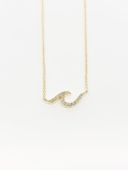 Avainna large wave necklace in gold. with crystals