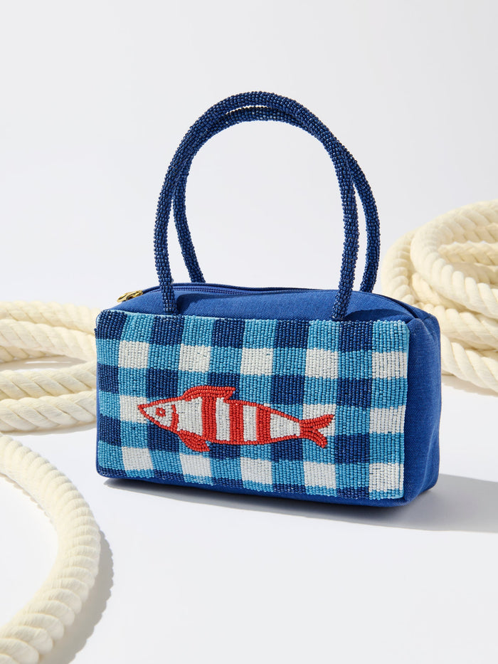 Blue checkered handbag with an orange fish design on a white background