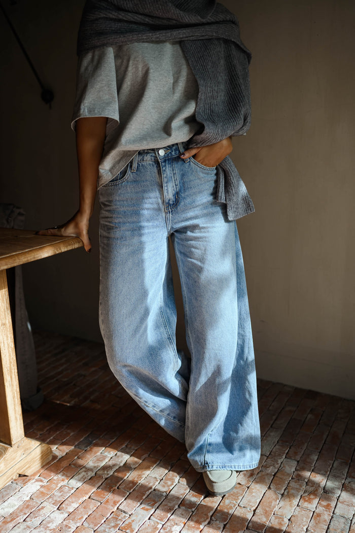 Blue Guetta jeans showing wide-leg fit