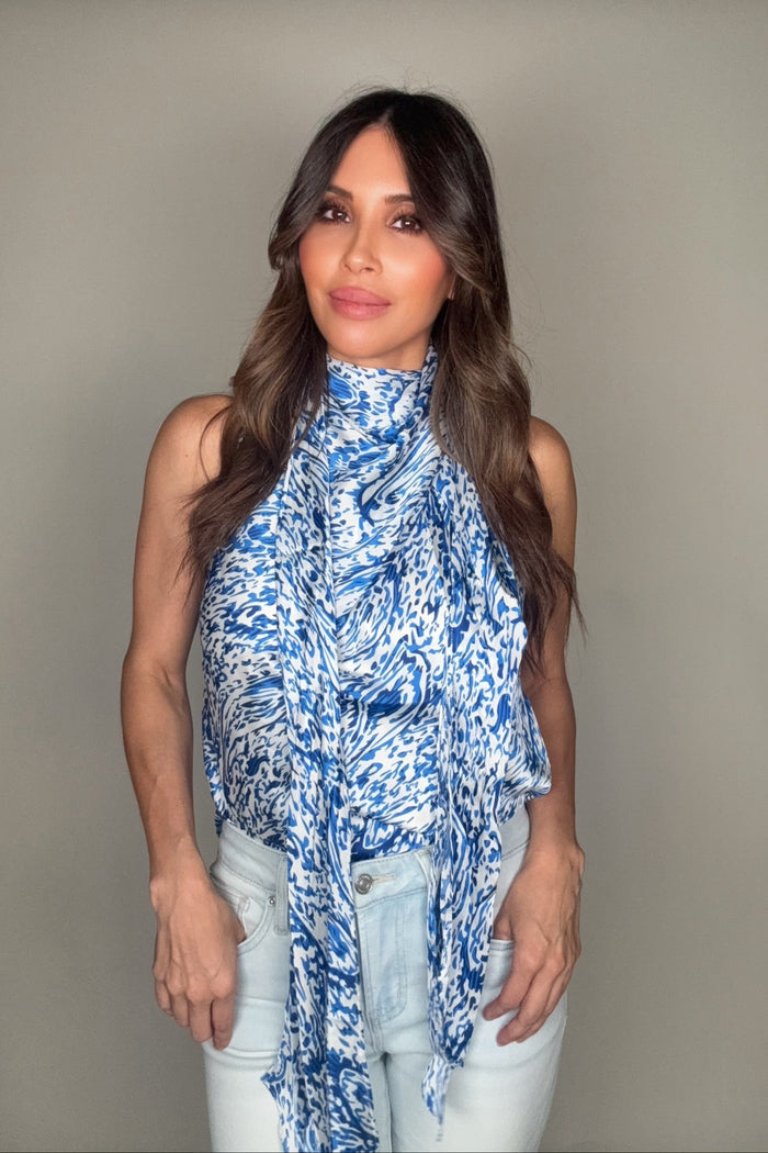 Style the Blue Mock Neck Tie Top exclusively at Born To Glam