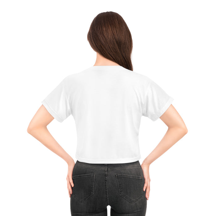 Person wearing a plain white t-shirt on a white background