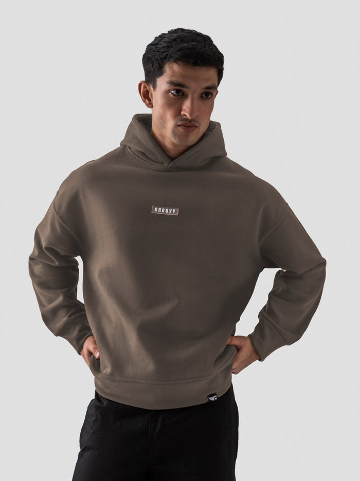 Camel brown oversized hoodie male model side view full body Pakistan – GROOVY
