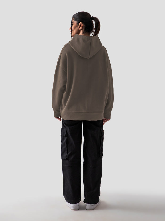Camel brown oversized hoodie detail closeup kangaroo pocket fabric texture Pakistan – GROOVY