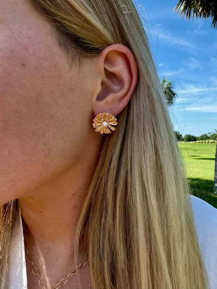 Catie Earrings in gold shown on model