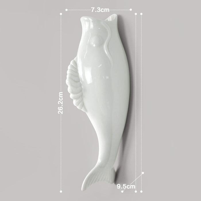 Modern ceramic wall vase with 3D goldfish design displayed for indoor wall decor in living rooms, studies and entrance areas.