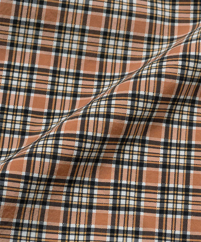 Brick check colored colored Gramicci Checkered Shell Shorts fabric swatch.