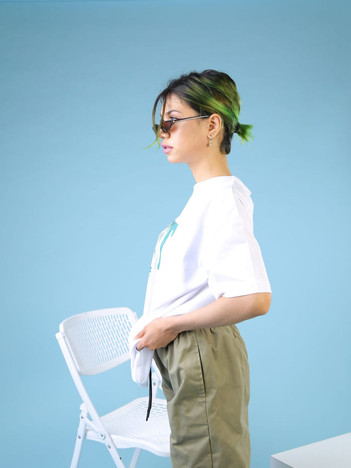 White Graphic Tee Couple Lifestyle Shot – Chill Out – GROOVY Pakistan