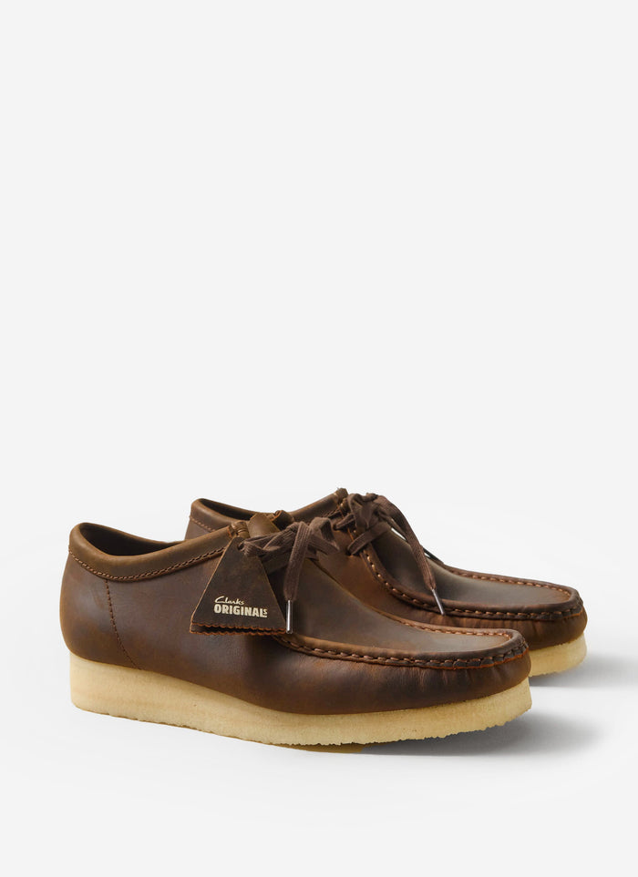 A pair of the classic Clarks Originals Wallabee shoes in beeswax brown leather, available from Percival.