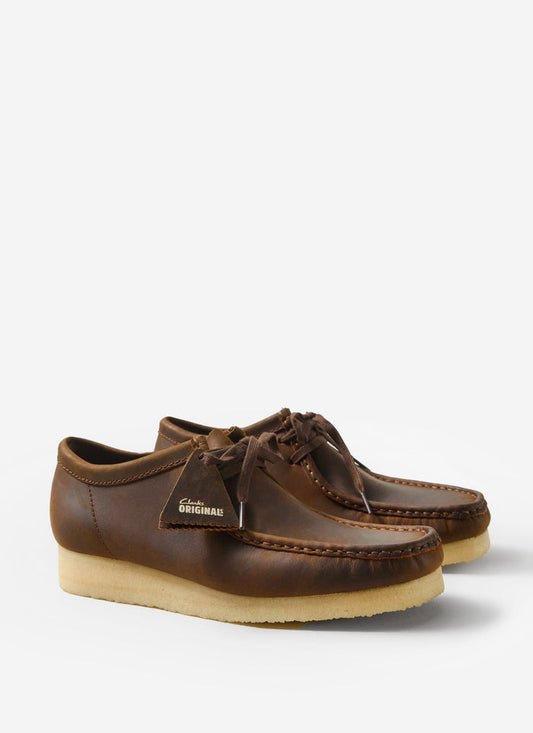 A pair of the classic Clarks Originals Wallabee shoes in beeswax brown leather, available from Percival.