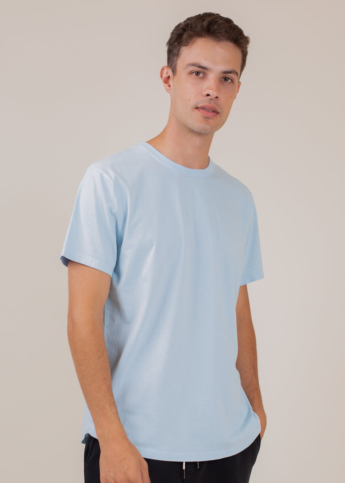 man wearing t-shirt in sky blue