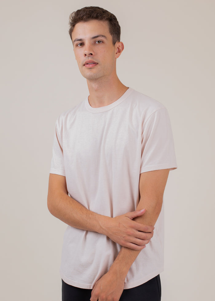 man wearing t-shirt in pink