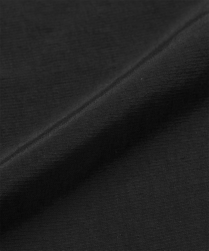 Black colored Gramicci Convertible Cargo Pants fabric swatch.