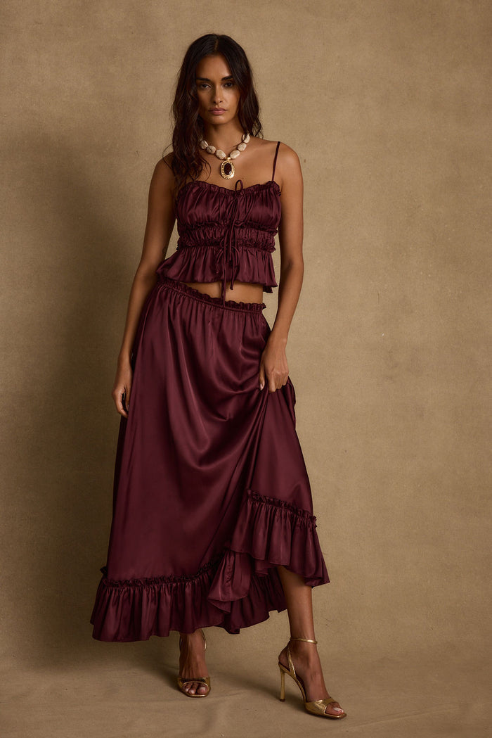 Satin maxi skirt with accents and a flattering silhouette.