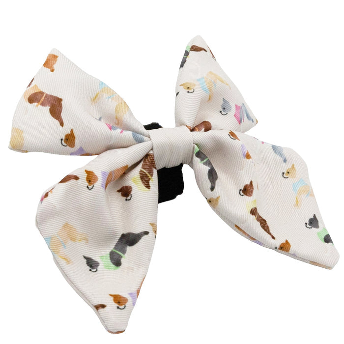 The Sassy Woof Dog Sailor Bow - Bold Boston Terriers features a large white bow with colorful Boston Terrier prints, attached to a black hair tie.