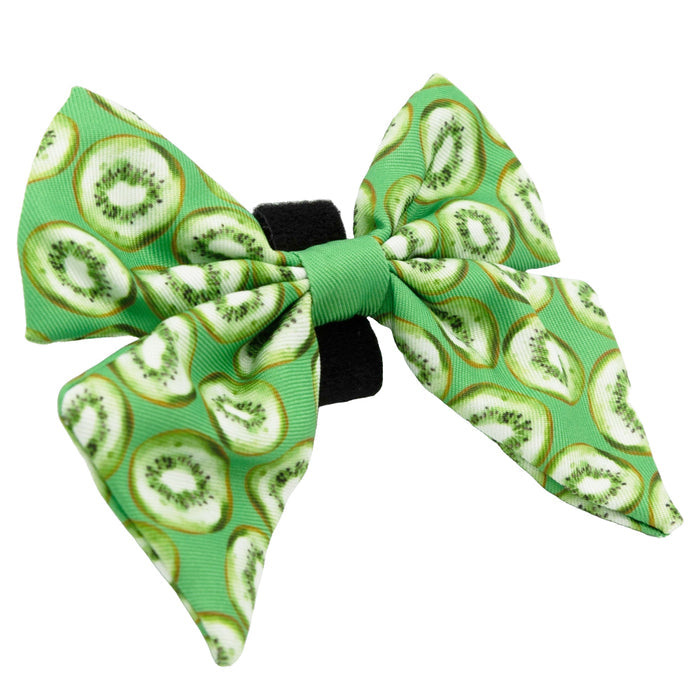 Add a splash of fun to your pup’s look with the Sassy Woof Dog Sailor Bow - Kiwi Krazy, featuring a sliced kiwifruit pattern and a black elastic band for easy wear—ideal for dogs who love playful, stylish accessories.