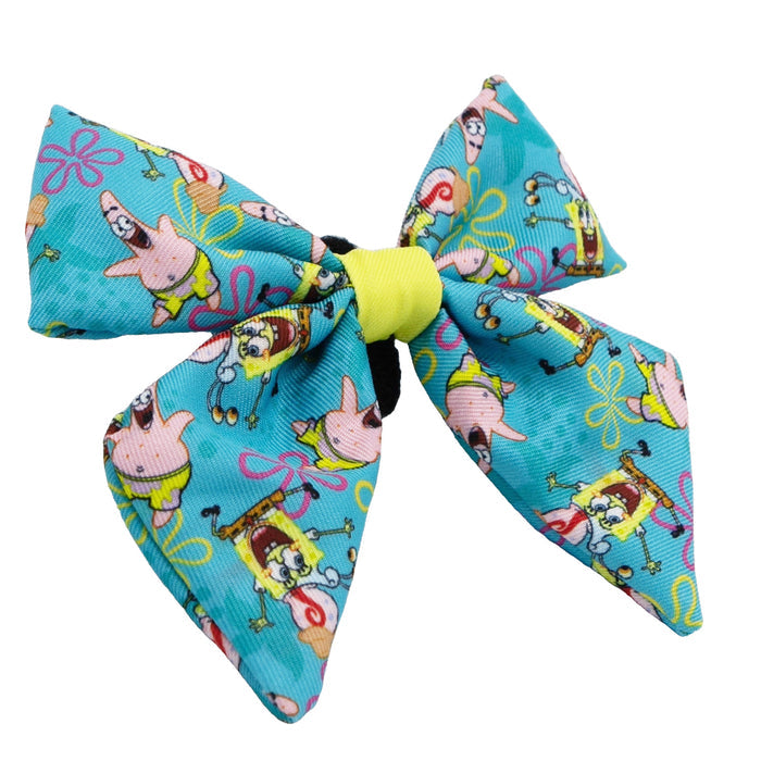 The Sassy Woof Dog Sailor Bow – SpongeBob SquarePants™ Jelly Fishin' features playful SpongeBob and Patrick designs, and pairs perfectly with other matching Sassy Woof dog accessories like the harness or leash.