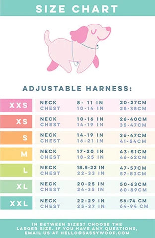 A size chart for adjustable dog harnesses, including the Sassy Woof Dog Two Piece Bundle - MLB™ x Peanuts™ Baltimore Orioles™, shows sizes XXS–XXL, neck and chest measurements (in/cm), a pink dog illustration, and contact info at the bottom.