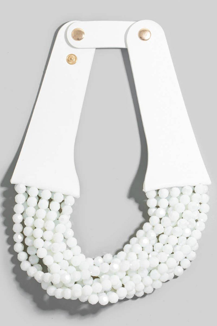 Style the Faux Leather And Faceted Beads Statement Necklace exclusively at Born To Glam