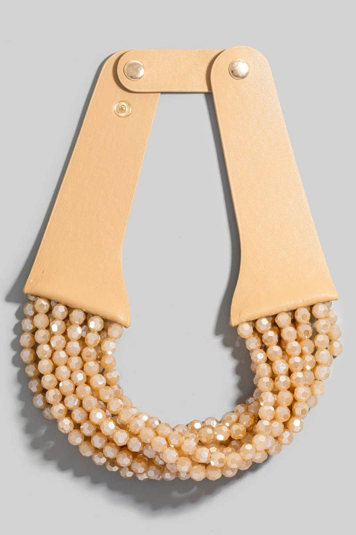 Style the Faux Leather And Faceted Beads Statement Necklace exclusively at Born To Glam