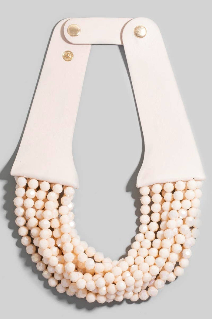 Style the Faux Leather And Faceted Beads Statement Necklace exclusively at Born To Glam