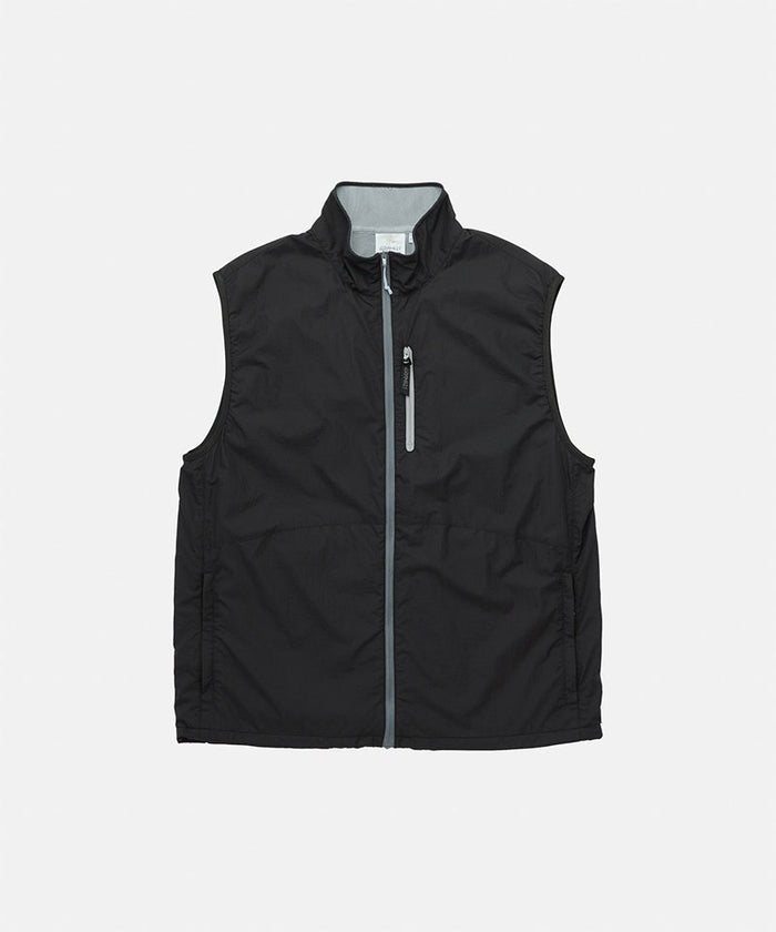 Gramicci black Flyweight Vest against a light-tone background.