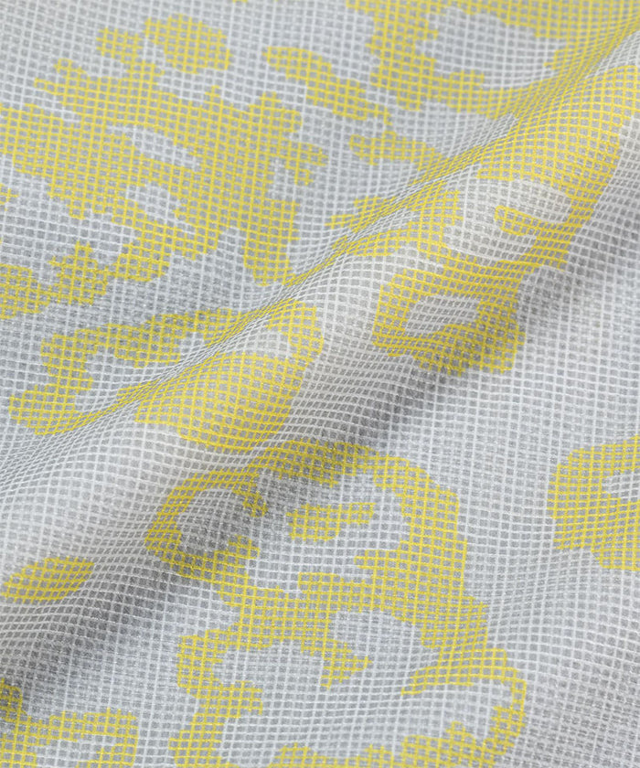 Gramicci yellow and grey grid camo Flyweight Vest fabric swatch.