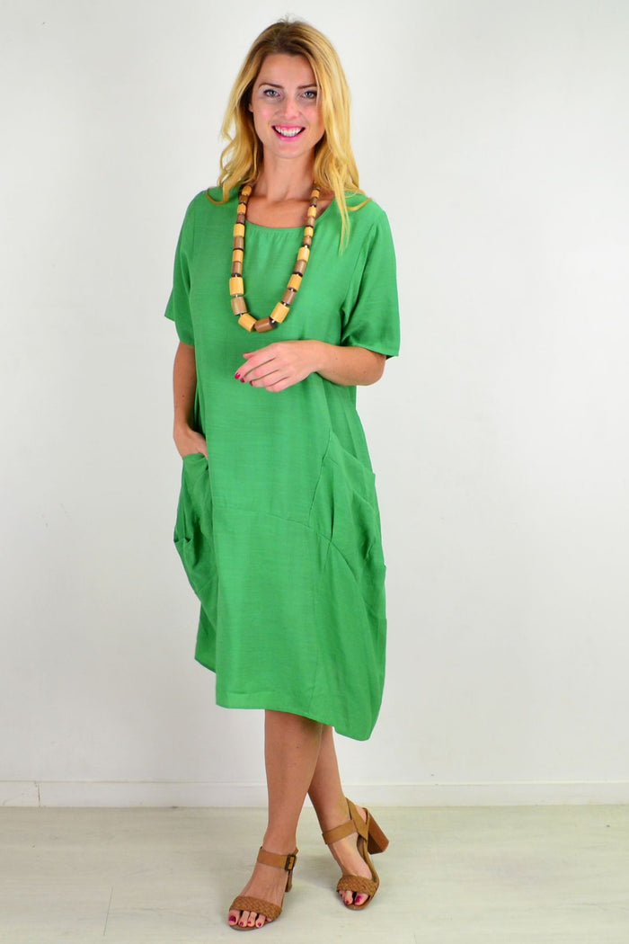 Green Grass Pocket Bubble Tunic Dress by La Mode, featuring a relaxed fit with pocket details and bubble silhouette.