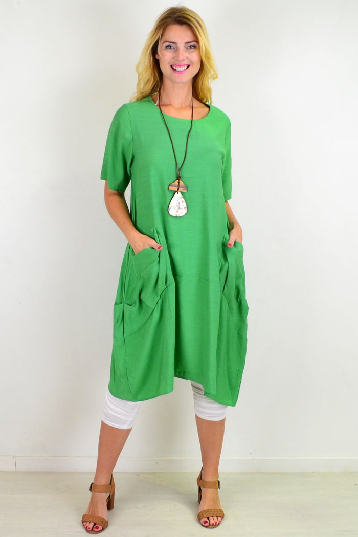 Green Grass Pocket Bubble Tunic Dress by La Mode, featuring a relaxed fit, bubble silhouette, and side pockets on soft fabric.