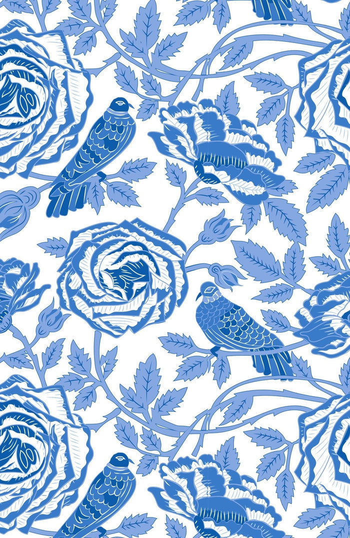 Blue and white floral pattern with birds up close