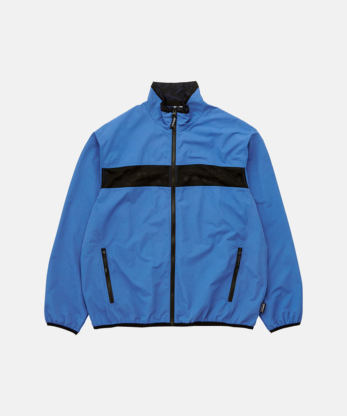 Gramicci navy blue Gramicci Guide Jacket against a light-tone background.