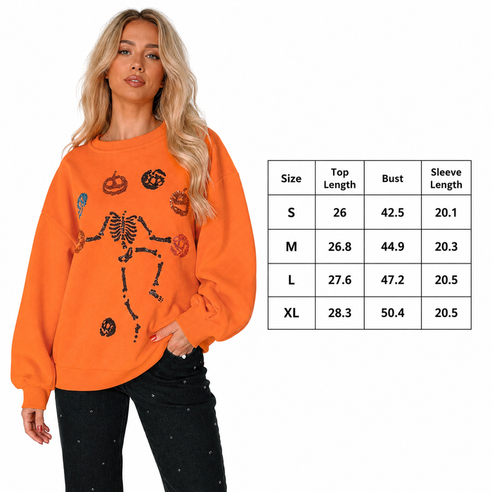 Size chart for orange women's skeleton pumpkin sweatshirt showing S, M, L and XL measurements to support confident selection.