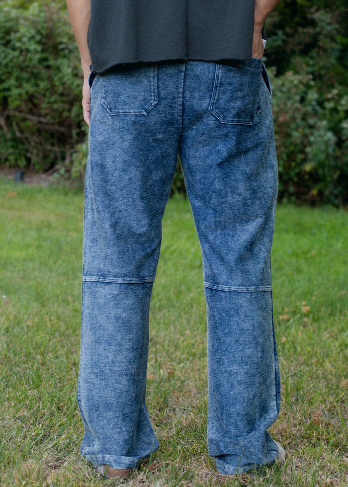 Close-up detail of Indigo Patch Trouser on model