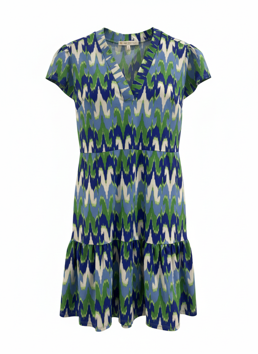 Multicolored patterned dress on a white background