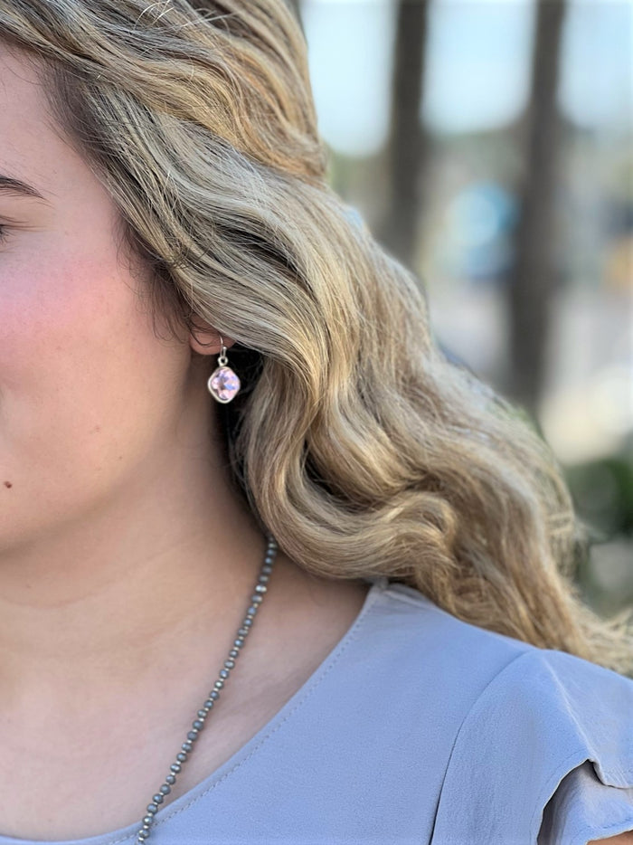 Kayla Earrings in pink and silver shown on model