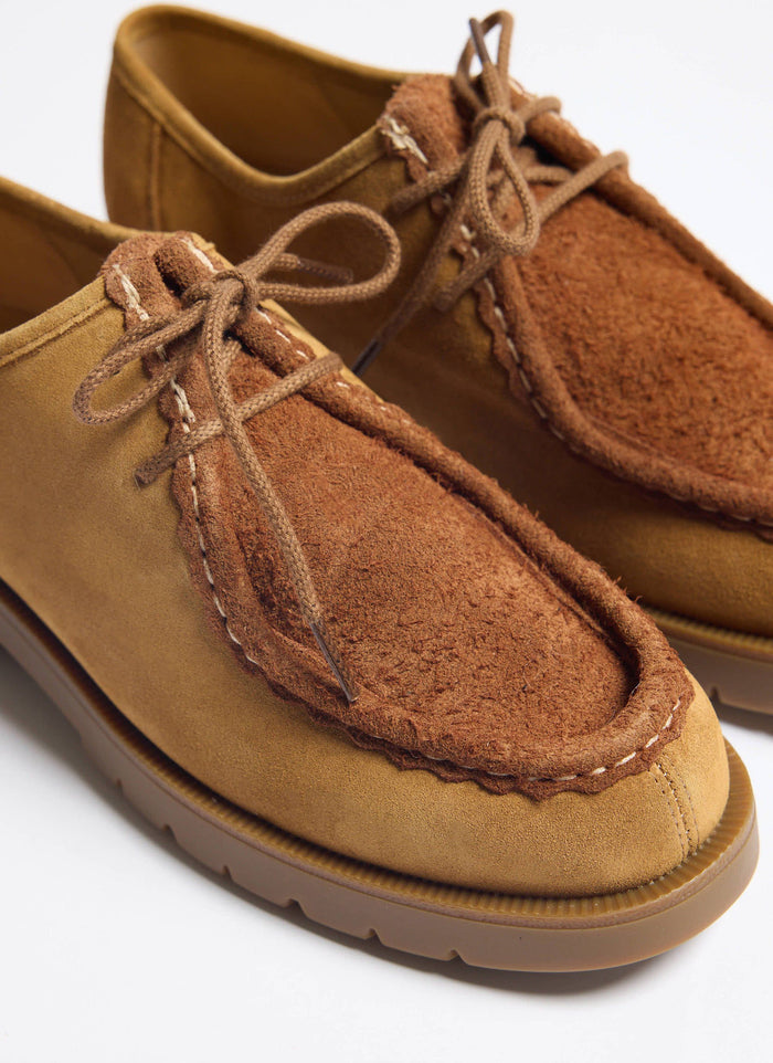 A close-up shot of the Kleman Padror VV2 shoe in cognac leather from Percival, highlighting its serrated hem and stitching.