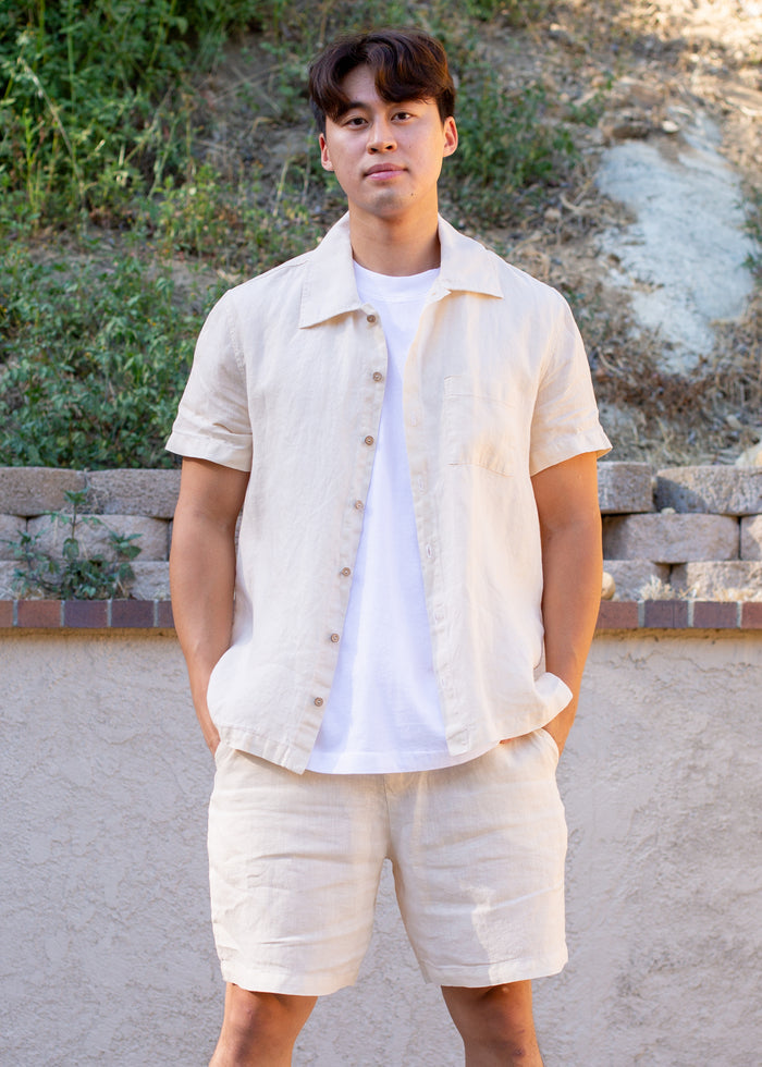 Back view of Linen Short in coconut milk on model