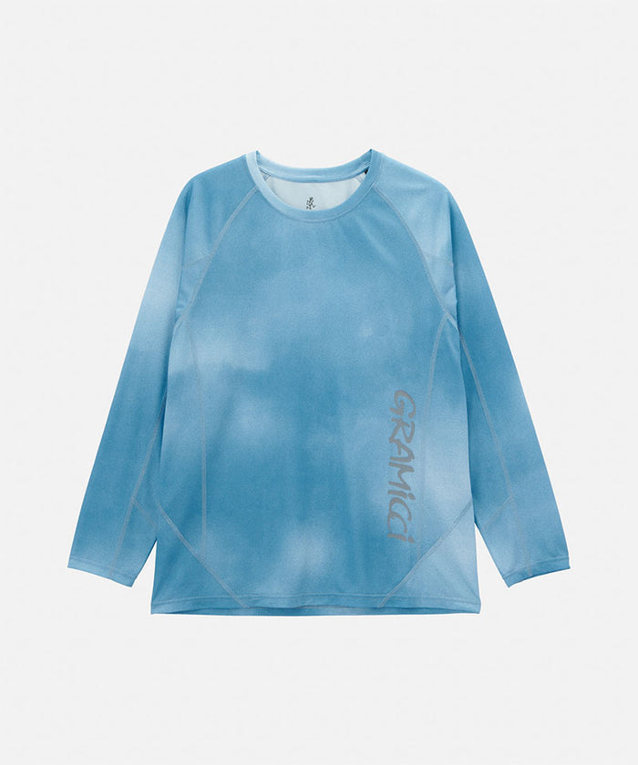 Gramicci blue tie-dye L/S 1st Layer shirt with grey graphic against a light-tone background.