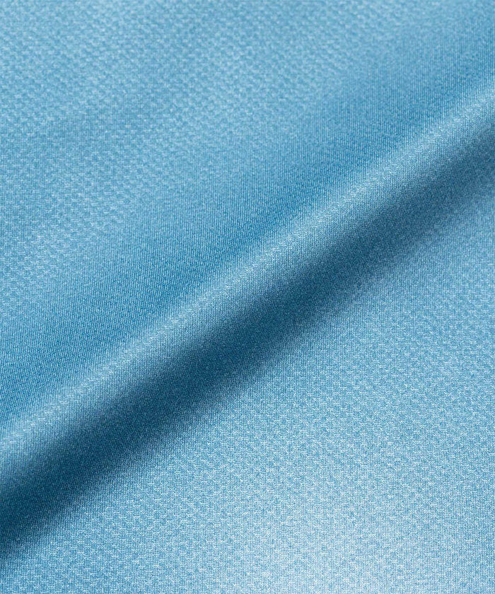 Gramicci blue tie-dye L/S 1st Layer shirt fabric swatch.