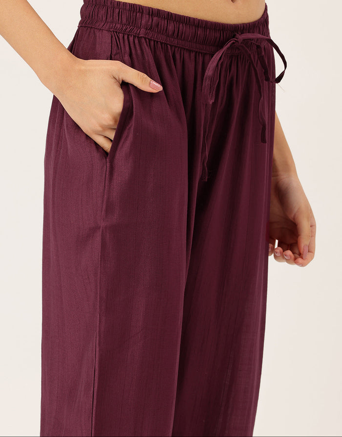 Maroon Floral Printed Roll-Up Sleeves A-Line Kurta & Trousers With Dupatta, Maroon kurta set, floral printed kurta set, A-line kurta set, kurta trouser dupatta set, women ethnic wear, Indian ethnic wear, printed kurta set, roll-up sleeves kurta set, maroon floral kurta set, festive wear for women kurta set