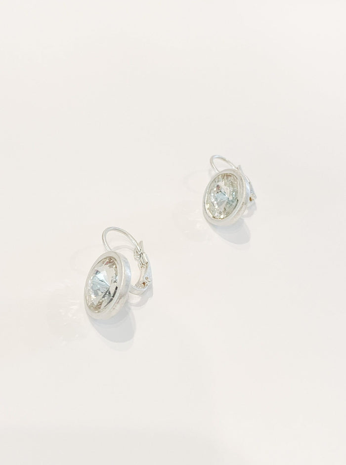 The Melissa Earrings in silver are the perfect touch to any outfit and feature a lever-back closure to stay secure while looking beautiful. Nickel free Lever-back closure Crystal accent Length : 3/4"