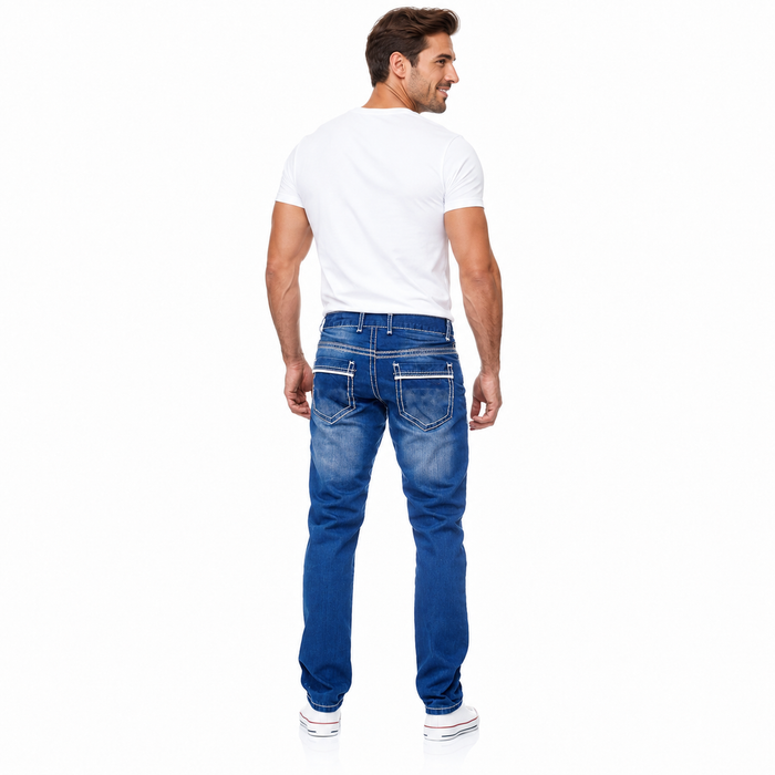 Men's straight fit jeans in blue shown from the back on a male model to highlight the rear pockets and stitching.