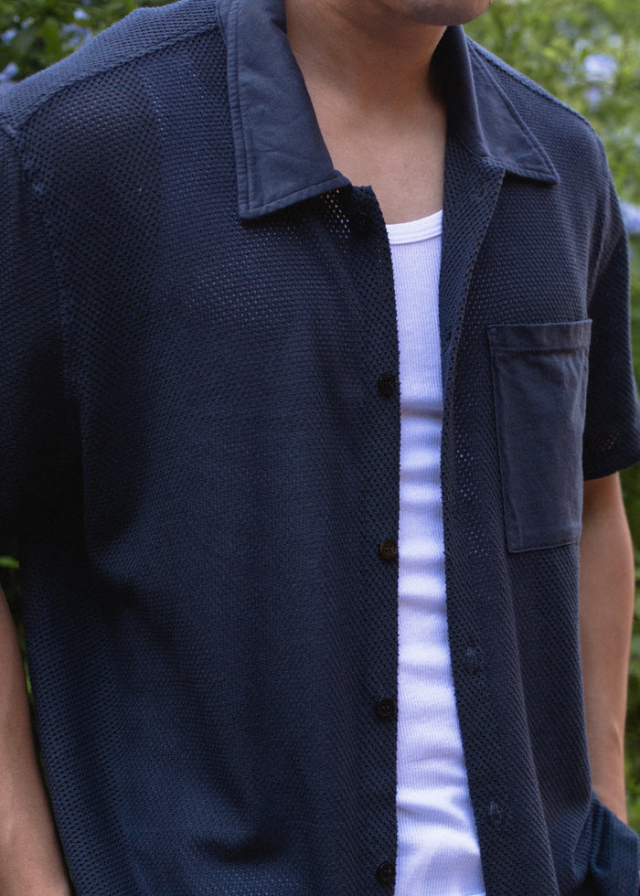 Close-up detail of Mesh Button Down on model