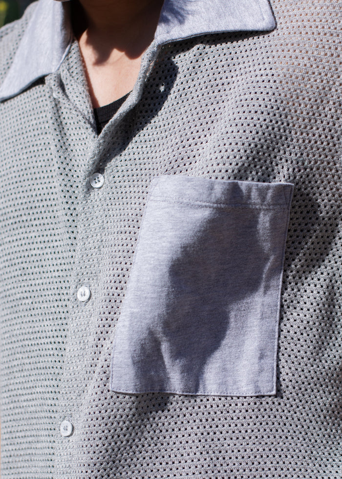 Close-up detail of Mesh Button Down on model