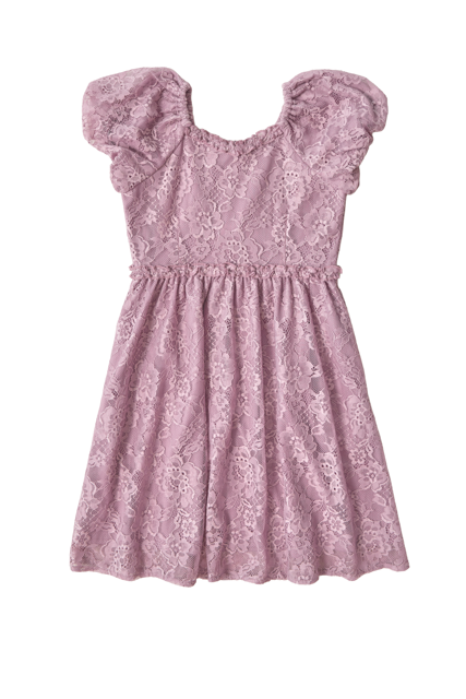 The Mini Kiara Dress in Hyssop Lace by Ivy City Co features light pink floral lace, short puff sleeves, and a gathered waist. Perfect for parties, the dress is shown against a white background.