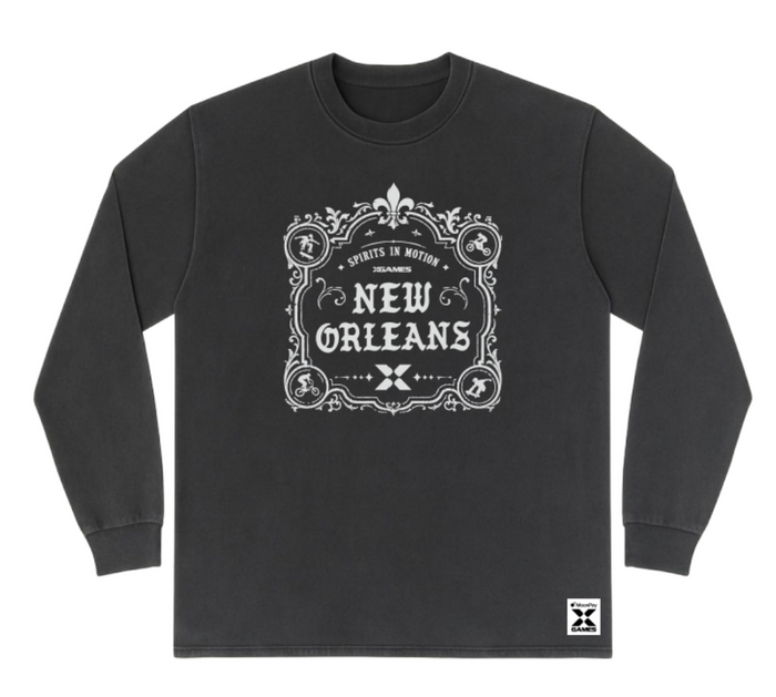 A dark charcoal gray long-sleeve t-shirt with a white graphic print on the front reading 'NEW ORLEANS' inside an ornate frame, shown on a plain white background.