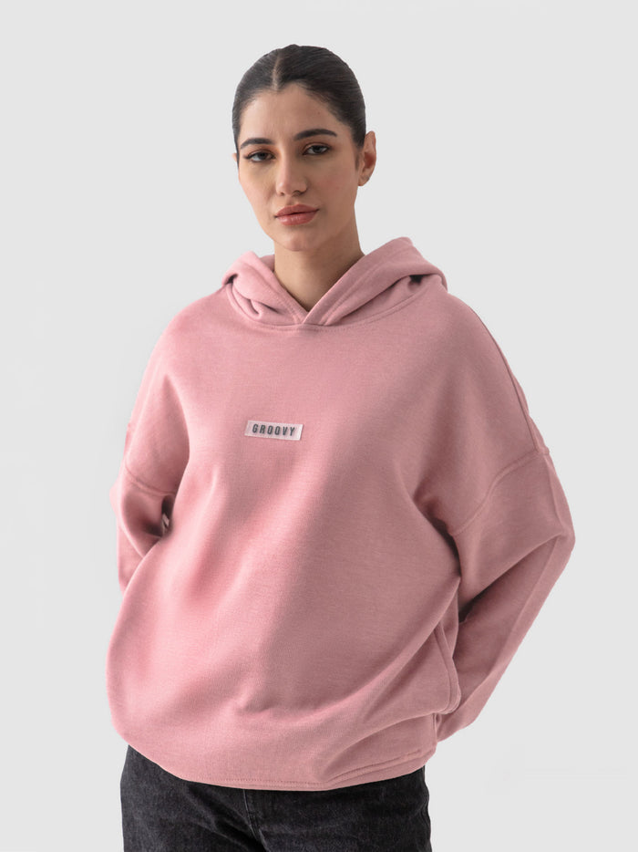 Pastel pink hoodie male model outdoor lifestyle shot Pakistan – GROOVY
